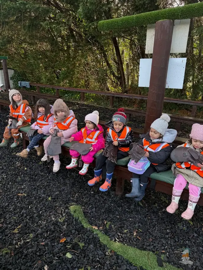 Children sitting together outdoors